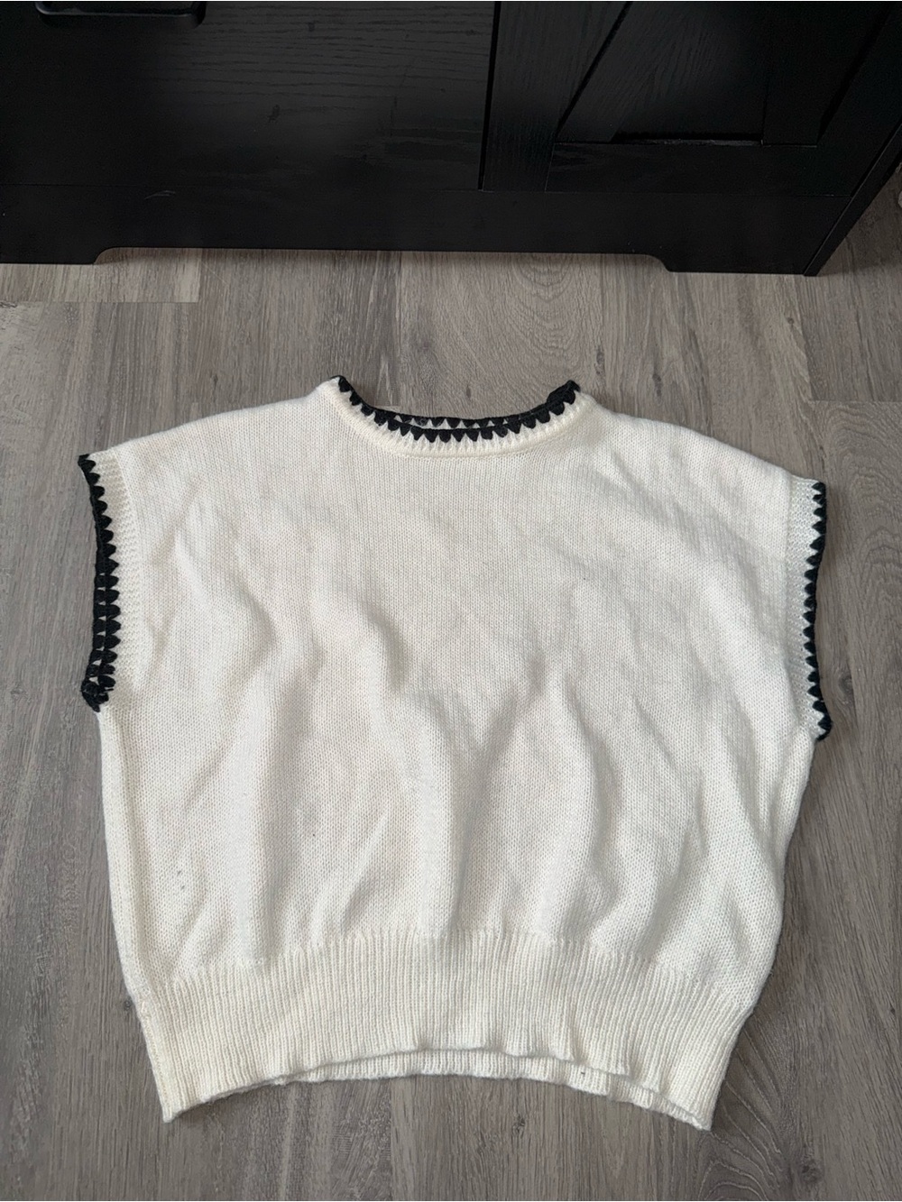 White Knit Sleeveless Sweater with Black Trim